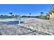 Community pool with a large patio area at 1560 Leamington Lane, Winter Haven, FL 33884