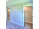 Bright bedroom with access to additional rooms at 1560 Leamington Lane, Winter Haven, FL 33884