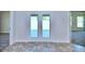 Open dining area with French doors leading outside at 1560 Leamington Lane, Winter Haven, FL 33884