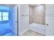 Clean bathroom with soaking tub and double vanity at 1560 Leamington Lane, Winter Haven, FL 33884