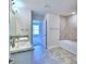 Modern bathroom featuring double sinks and a bathtub at 1560 Leamington Lane, Winter Haven, FL 33884