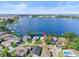 Aerial view highlighting lakefront home location and neighborhood at 1437 Grand Cayman Cir, Winter Haven, FL 33884