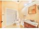Bathroom with toilet, sink, and shower at 29 Turtle Ln, Haines City, FL 33844