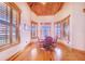 Small breakfast nook with wood floors and window seating at 29 Turtle Ln, Haines City, FL 33844