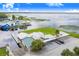 Aerial view of waterfront property with large parking and building at 29 Turtle Ln, Haines City, FL 33844