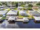 Aerial view of waterfront home with private dock and expansive lot at 29 Turtle Ln, Haines City, FL 33844