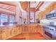 Modern kitchen with stainless steel appliances and hardwood floors at 29 Turtle Ln, Haines City, FL 33844