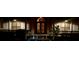 Night view of home's front entrance with decorative lighting at 29 Turtle Ln, Haines City, FL 33844