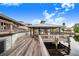 Long wooden dock with gazebo and waterfront views at 29 Turtle Ln, Haines City, FL 33844