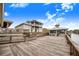 Expansive wooden deck offering waterfront access at 29 Turtle Ln, Haines City, FL 33844
