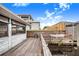 Wooden deck featuring outdoor sink and water views at 29 Turtle Ln, Haines City, FL 33844