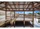 Wooden boat lift and dock with water access at 29 Turtle Ln, Haines City, FL 33844