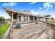 Large deck offering views of home exterior and AC unit at 29 Turtle Ln, Haines City, FL 33844