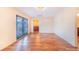 Bright bedroom with wood floors and access to a private balcony at 29 Turtle Ln, Haines City, FL 33844