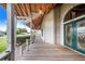 View of a spacious front porch with double doors at 29 Turtle Ln, Haines City, FL 33844
