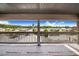 Covered balcony overlooking waterfront homes and lush scenery at 29 Turtle Ln, Haines City, FL 33844
