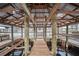 Covered boat lift with wooden structure overhead at 29 Turtle Ln, Haines City, FL 33844
