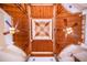 High, wood-beamed ceiling with two ceiling fans and chandelier at 29 Turtle Ln, Haines City, FL 33844