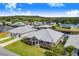 Two-story home aerial view, showcasing a large backyard and water access at 29 Turtle Ln, Haines City, FL 33844