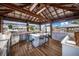 Covered outdoor kitchen with island and seating area at 29 Turtle Ln, Haines City, FL 33844