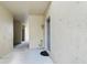 Building exterior showing hallway and a single entry door at 2049 San Marcos Se Dr # 127, Winter Haven, FL 33880