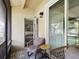 Outdoor patio with seating area and access to the interior at 2049 San Marcos Se Dr # 127, Winter Haven, FL 33880