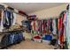 Large walk-in closet with ample shelving and hanging space at 3540 Julius Estates Blvd, Winter Haven, FL 33881