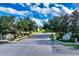 Lake Smart community entrance with street view and neighborhood signage at 3540 Julius Estates Blvd, Winter Haven, FL 33881
