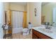 Bathroom with tub, toilet, and vanity at 3540 Julius Estates Blvd, Winter Haven, FL 33881