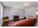 Spacious living room with hardwood floors and a comfortable leather couch at 3540 Julius Estates Blvd, Winter Haven, FL 33881