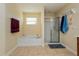 Bathroom with shower, tub, and linen storage at 3540 Julius Estates Blvd, Winter Haven, FL 33881