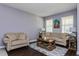 Living room with neutral colored furniture and wood coffee table at 3540 Julius Estates Blvd, Winter Haven, FL 33881