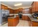 Kitchen with granite countertops, stainless steel appliances, and wood cabinets at 3540 Julius Estates Blvd, Winter Haven, FL 33881