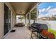 Relaxing screened patio with grill and table, perfect for outdoor dining at 3540 Julius Estates Blvd, Winter Haven, FL 33881