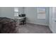Home office with desk, chair, and large windows at 1011 Overlook Ct, Davenport, FL 33837
