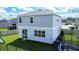 House backyard with playset, trampoline, and fence at 1011 Overlook Ct, Davenport, FL 33837