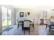 Casual dining area with table and chairs near kitchen and sliding door at 1011 Overlook Ct, Davenport, FL 33837