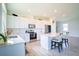 Modern kitchen with white cabinets, stainless steel appliances, and an island at 1011 Overlook Ct, Davenport, FL 33837