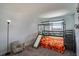 bedroom with bunk bed, slide, and ample closet space at 1011 Overlook Ct, Davenport, FL 33837