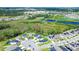 Aerial view showcasing a house and surrounding landscape at 1011 Overlook Ct, Davenport, FL 33837