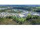 Aerial view of a house and surrounding neighborhood at 1011 Overlook Ct, Davenport, FL 33837