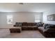 Spacious living room with sectional sofa and neutral decor at 1011 Overlook Ct, Davenport, FL 33837
