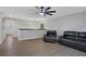 Spacious loft with seating area and ceiling fan at 2433 Home Again Rd, Apopka, FL 32712