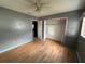 Bedroom with wood-look floors and a closet at 100 Stevenson Rd, Winter Haven, FL 33884