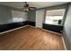 Bright bedroom with wood-look flooring and neutral colors at 100 Stevenson Rd, Winter Haven, FL 33884