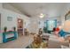 Open living area with a view into the bedroom and access to the front door at 4234 Cerimen St, Lake Wales, FL 33898