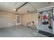 Garage with bicycle and storage on wall at 4234 Cerimen St, Lake Wales, FL 33898
