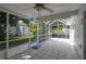 Spacious screened porch with tile floor at 4234 Cerimen St, Lake Wales, FL 33898