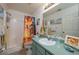 Clean bathroom with a shower/tub combo and updated vanity at 4234 Cerimen St, Lake Wales, FL 33898