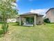 House with covered patio and spacious backyard at 278 Alford Dr, Davenport, FL 33896